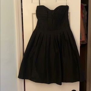 Black strapless dress. White House Black market